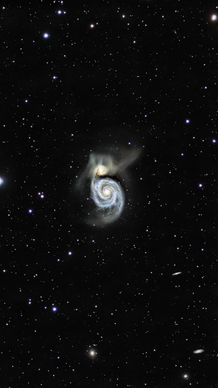 Messier 51 
M51 is a pair of interacting galaxies, NGC 5194 and NGC 5195, their last close approach was about 400 million years ago. They are now 500,000 light years apart with the smaller NGC5195 behind the larger galaxy. That last closest approach caused an enormous amount of star formation in the larger galaxy. We can see this happening in the spiral arms as blue and pink blobs. The close approach also stripped stars out of the galaxies and we see them as a glow of streamers emitted from the galaxies.

The galaxy was first seen by Charles Messier in 1773, although he only saw the brighter of the two galaxies, it wasn’t until 1781 when Pierre Méchain observed the companion galaxy. It wasn’t until the 19th before the spiral structure of the galaxy was discovered by the 3rd Earl of Rosse in Ireland using his 72” telescope known as the Leviathan of Parsonstown in 1848. The first photograph of M51 was taken in 1889.

There have been four recent supernovae in M51, 1945, 1994, 2005 and 2011. So it’s one worth keeping an eye on.

This image was taken over 13 nights through April and May 2025, with the SeeStar S50. A total exposure of 25h 10m 20s made from 20 and 30” subs, processed with PixInsight
Link-words: Messier Galaxy
