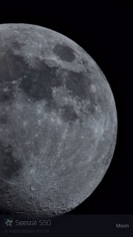 Mare Tranquillitatis 
Darkest shadow on right side- where Apollo 11 landed first humans on the Moon, also where Apollo 17 landed and last human to walk on the Moon- Gene Cernan
